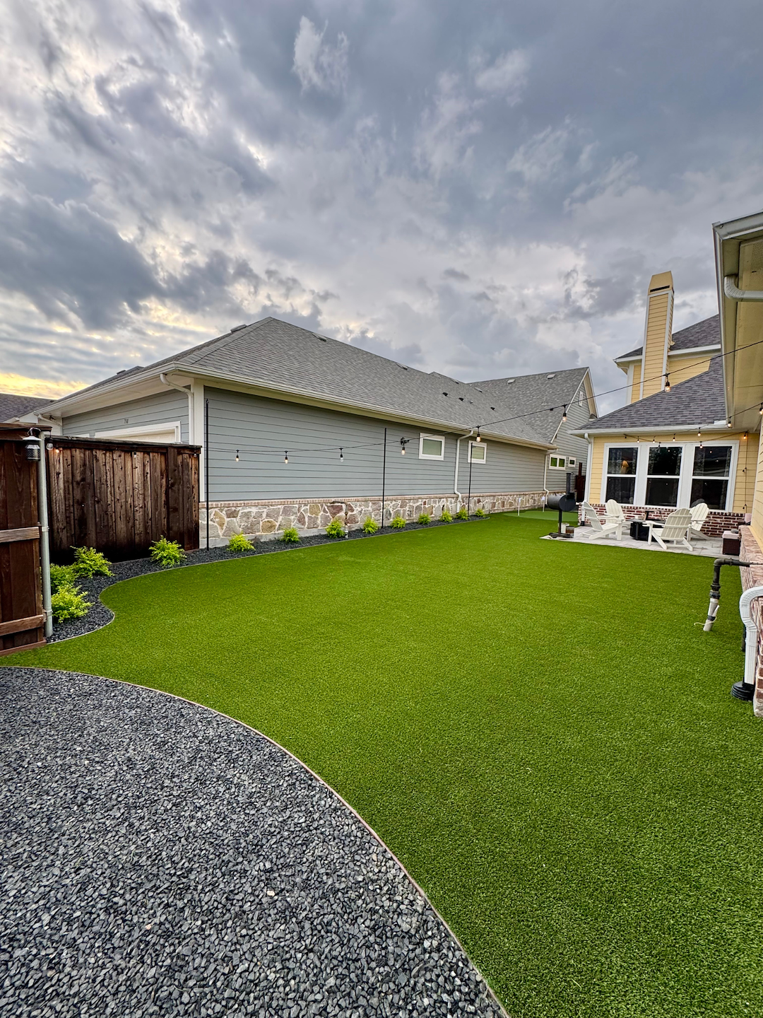 Backyard Redesign with Artificial Turf, Putting Green & Landscape Rock Installation in McKinney, TX 